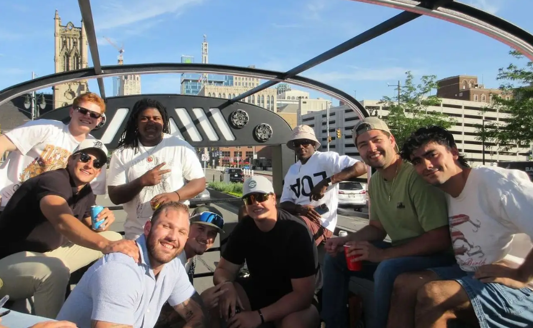 Motown Boogie Bus glowing under city lights