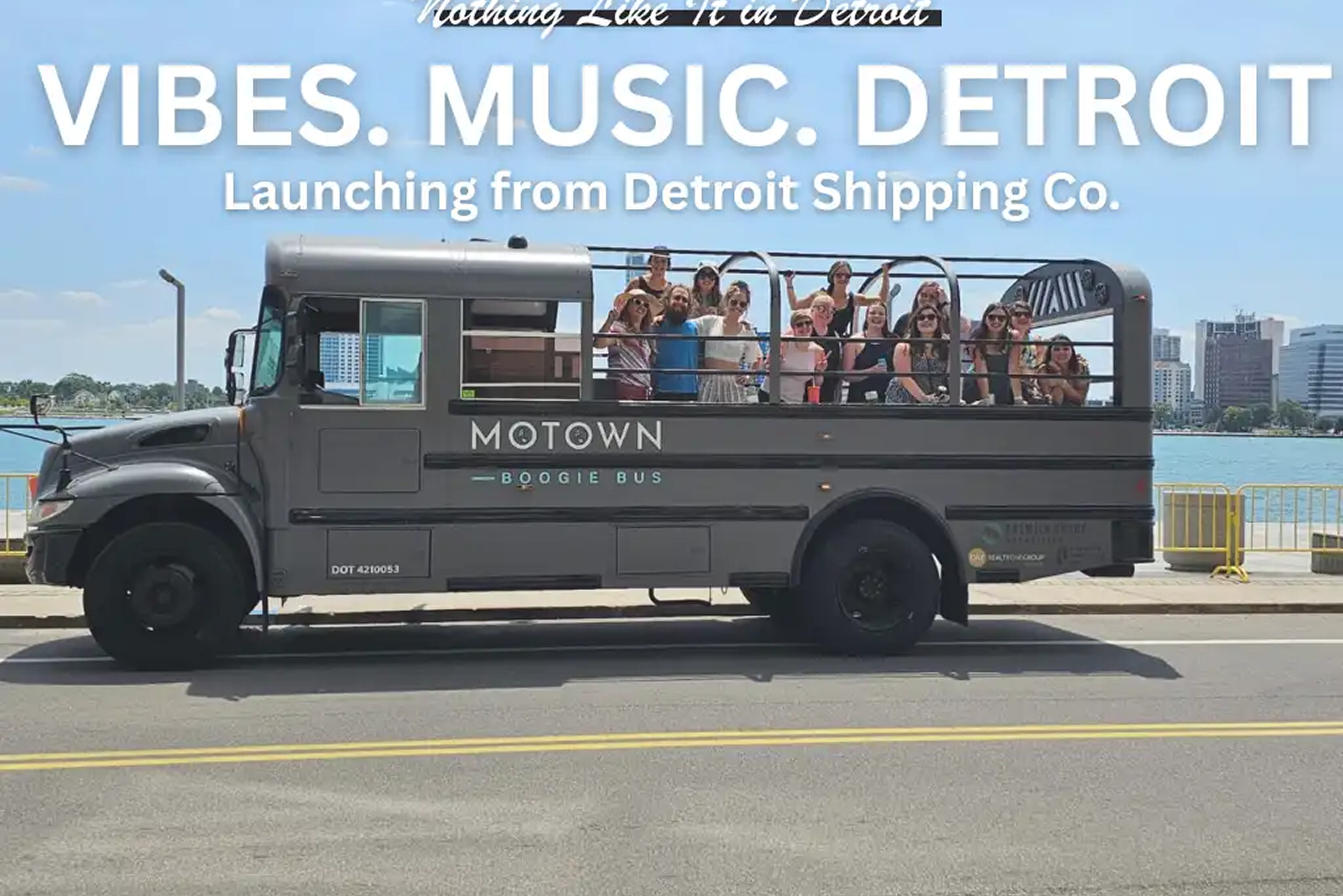 Friends celebrating on a party bus in Detroit