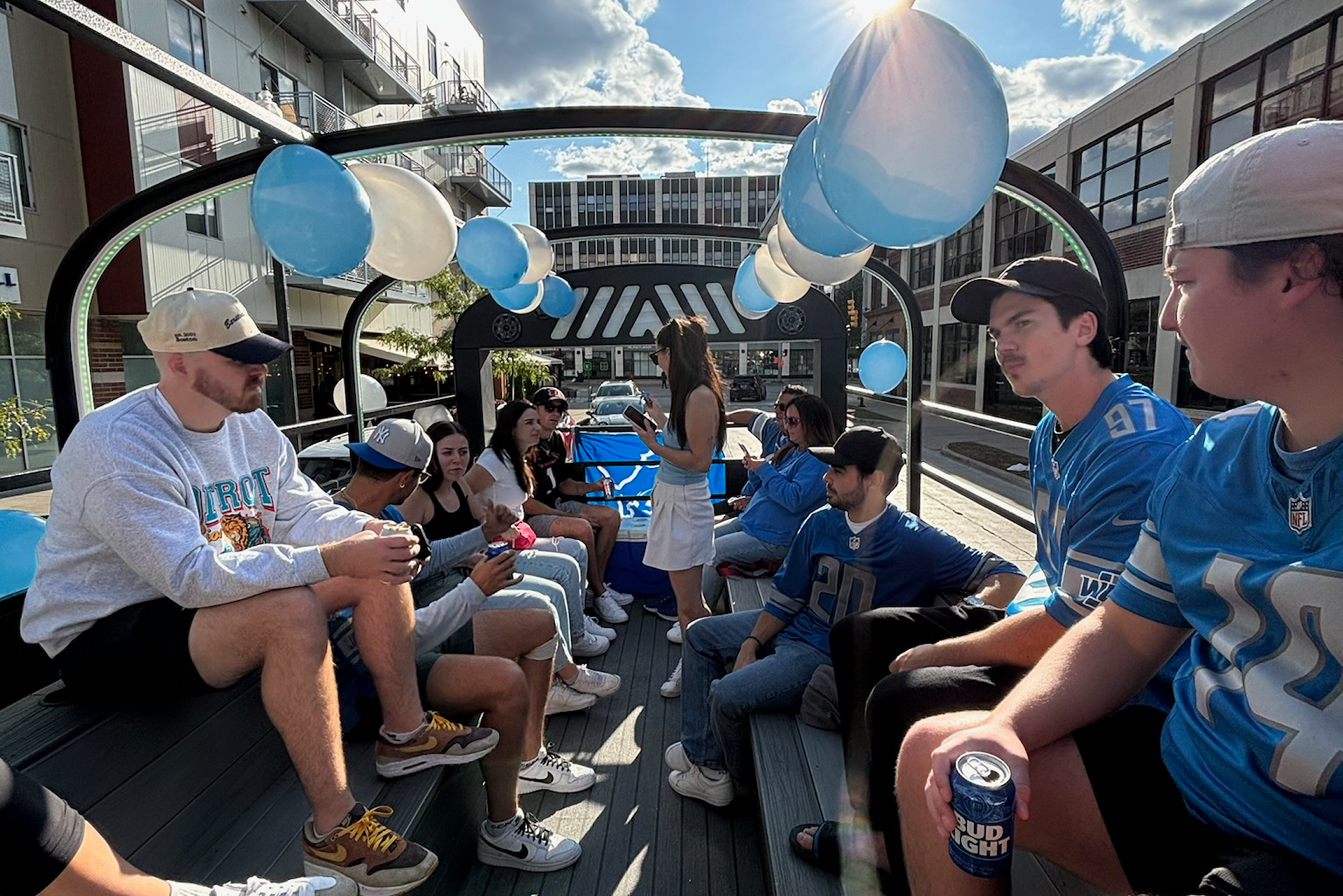 Group of friends enjoying a Detroit bar crawl